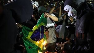 Teachers protest as anger grows over cost of World Cup