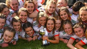<p>1 April 2022; Sacred Heart Secondary captain Lydia Sutton, and her team mates celebrate after she had lifted the cup after the Lidl All Ireland Post Primary Schools Senior ‘C’ Championship Final match between Our Lady's Bower, Athlone, Westmeath and Sacred Heart Secondary, Clonakilty, Cork at Sean Treacy Park in Tipperary Town. Photo by Ray McManus/Sportsfile</p>