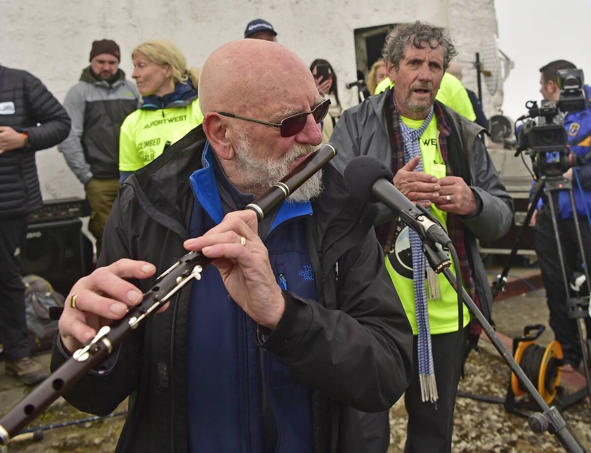 Cheiftian Matt Molloy played some traditional tunes on the summit of Croagh Patrick. Picture: Conor McKeown Cheiftian Matt Molloy played some traditional tunes on the summit of Croagh Patrick. Picture: Conor McKeown