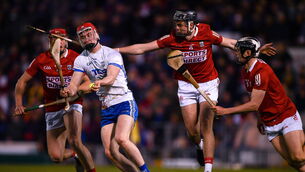 <p>2 April 2022; Carthach Daly of Waterford is tackled by Darragh Fitzgibbon, left, and Ger Millerick of Cork during the Allianz Hurling League Division 1 Final match between Cork and Waterford at FBD Semple Stadium in Thurles, Tipperary. Photo by Ray McManus/Sportsfile</p>