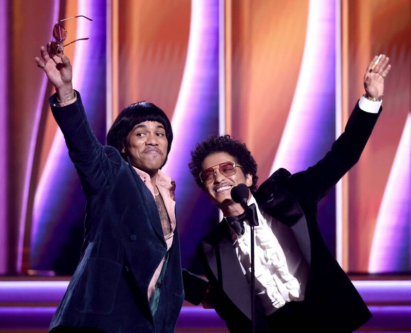 (L-R) Anderson .Paak and Bruno Mars of Silk Sonic accept Record Of The Year award for "Leave The Door Open."