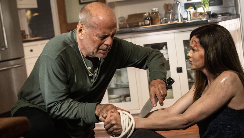 Bruce Willis as Frank and Lydia Hull as Jan in 'Survive The Night'. Picture: PA Photo/Lionsgate Films/Brian Douglas