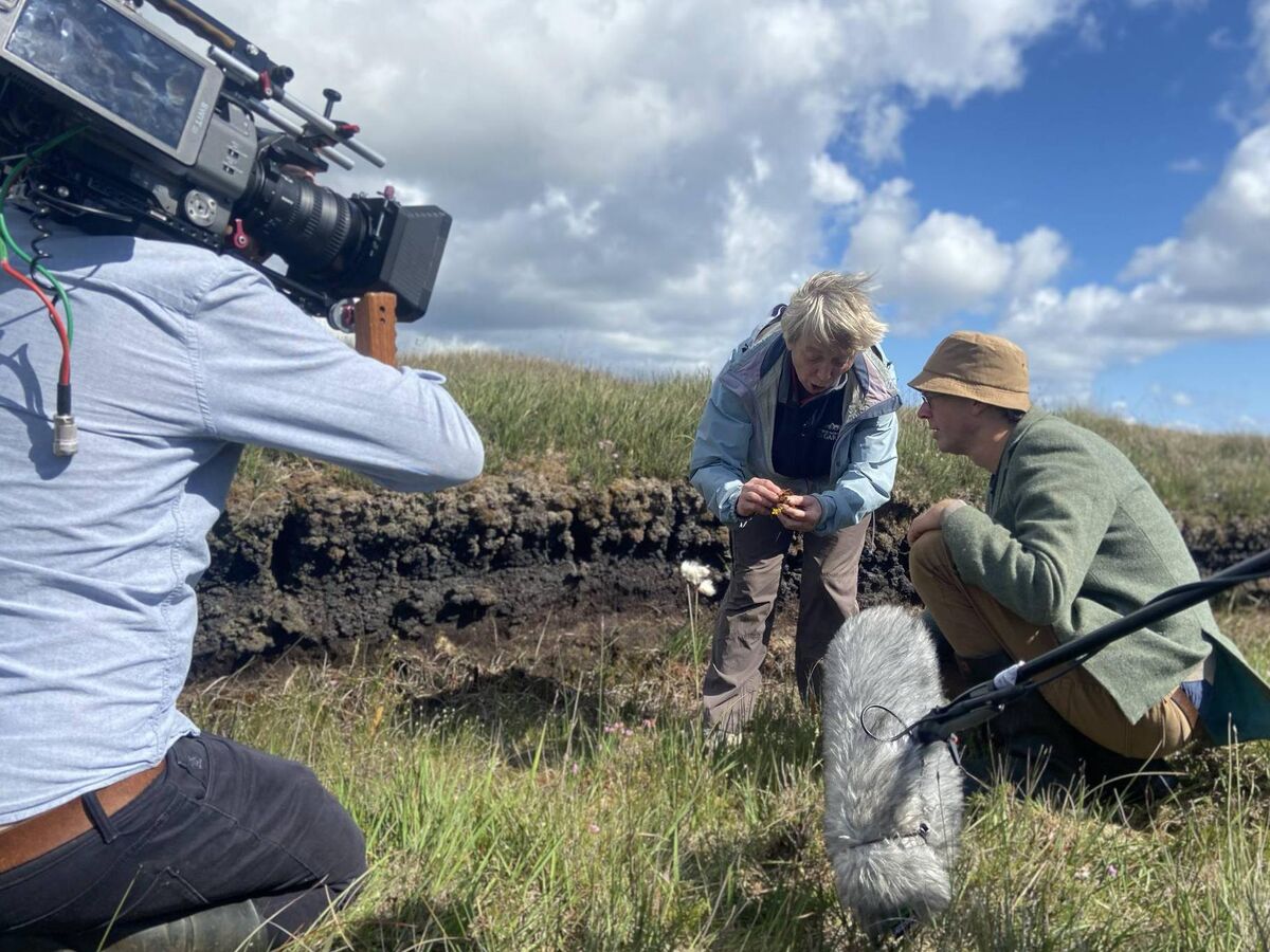 Manchán Magan and Eanna Ní Lamhna on a bog during the filming of An Fód Deireanach on TG4. Manchán Magan and Eanna Ní Lamhna on a bog during the filming of An Fód Deireanach on TG4.