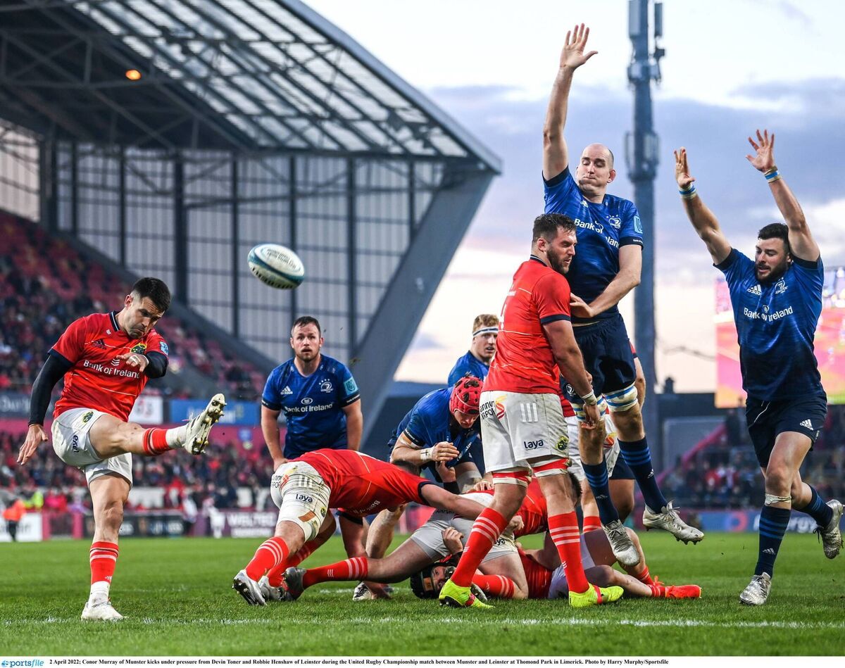 UP AND AWAY: Munster's Conor Murray clears under pressure from Devin Toner and Robbie Henshaw of Leinster. Pic: Harry Murphy/Sportsfile