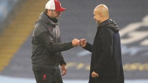Liverpool manager Jurgen Klopp, left, and Manchester City boss Pep Guardiola go head to head this weekend (Martin Rickett/PA)
