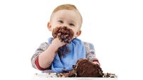 iStock-135326767_2.jpg A messy baby eating his chocolate cake
