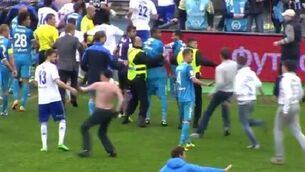 VIDEO: Russian player Granat in broken-jaw fear after pitch invasion