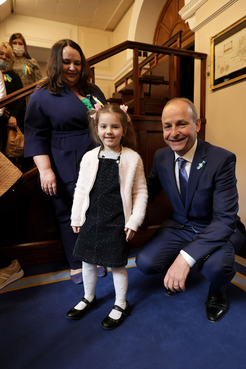 Ukrainian ambassador to Ireland Larysa Gerasko, Anastasiia Semonova, age five, daughter of Yana Semenova, and Taoiseach Micheál Martin at Leinster House after the address by Volodymyr Zelenskyy, president of Ukraine. Picture: Maxwells Ukrainian ambassador to Ireland Larysa Gerasko, Anastasiia Semonova, age five, daughter of Yana Semenova, and Taoiseach Micheál Martin at Leinster House after the address by Volodymyr Zelenskyy, president of Ukraine. Picture: Maxwells