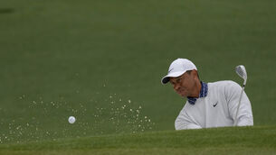 <p>Tiger Woods struggled on the greens during the third round of the Masters (Matt Slocum/AP)</p>