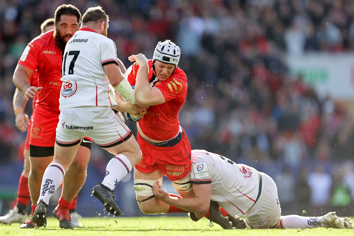 Toulouse's Thibaud Flament is tackled by Iain Henderson and Andrew Warwick of Ulster