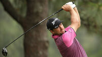 McDowell claims share of US Open lead