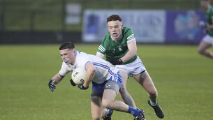 <p>Waterford’s Kealan Taylor gets to the ball ahead of Limerick’s Aaron Neville in last night’s EirGrid Munster U20 FC quarter-final at Fraher Field, Dungarvan. 	Picture: Patrick Browne</p>