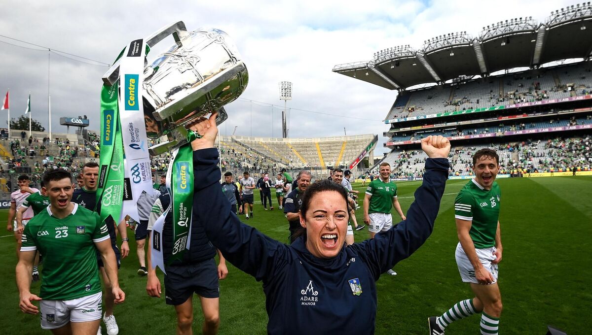 All in the mind: Performance psychologist Caroline Currid raises the Liam MacCarthy Cup after helping Limerick to another All-Ireland. Picture: Stephen McCarthy/Sportsfile