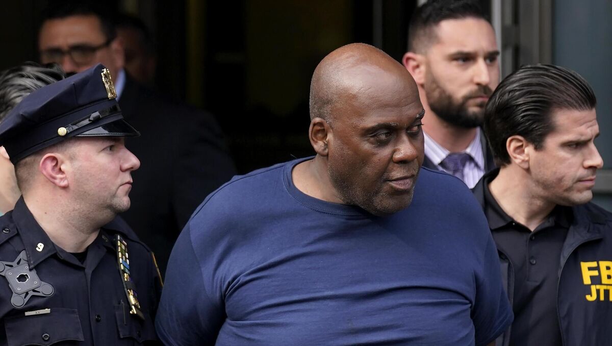 Law enforcement officials lead subway shooting suspect, 62-year-old Frank R. James (centre) away from a police station in New York last Wednesday. Picture: Seth Wenig/AP. Law enforcement officials lead subway shooting suspect, 62-year-old Frank R. James (centre) away from a police station in New York last Wednesday. Picture: Seth Wenig/AP.