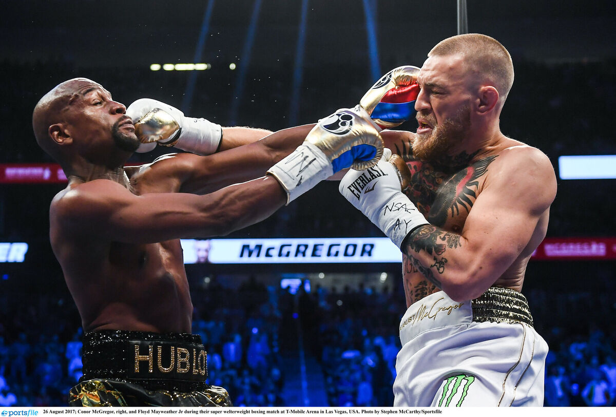 Conor McGregor, right, and Floyd Mayweather Jr during their super welterweight boxing match at T-Mobile Arena in Las Vegas, USA. Picture: Stephen McCarthy/Sportsfile