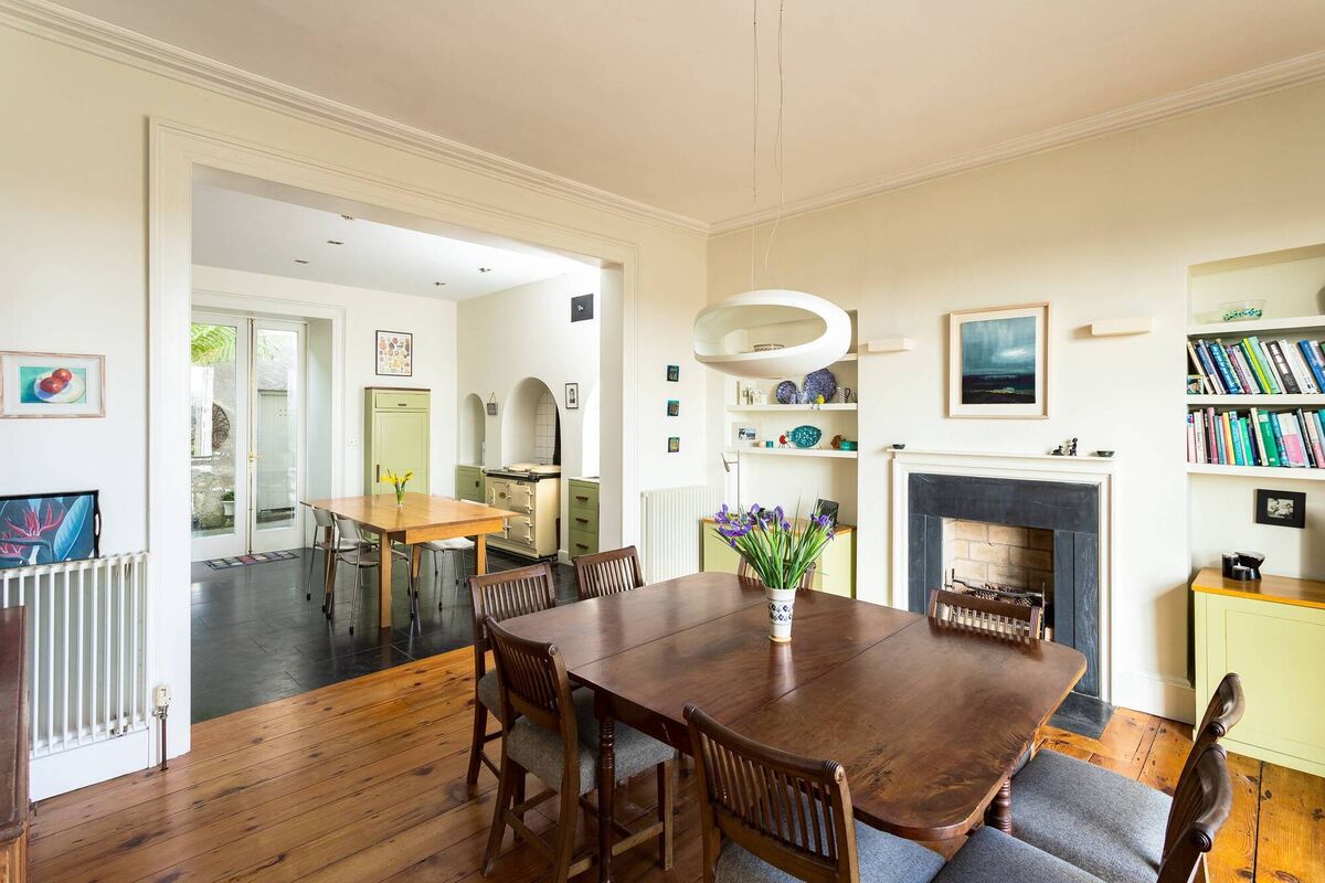Italian lighting in the kitchen/dining  room with Aga in background