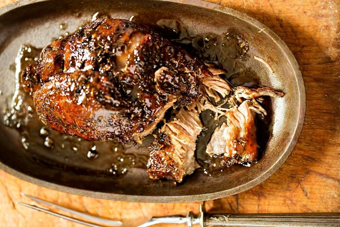 Slow roast shoulder of spring lamb with wild garlic aioli and fresh mint chutney