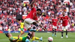 <p>Norwich City's Dimitris Giannoulis challenges Manchester United's Marcus Rashford during the Premier League match at Old Trafford</p>