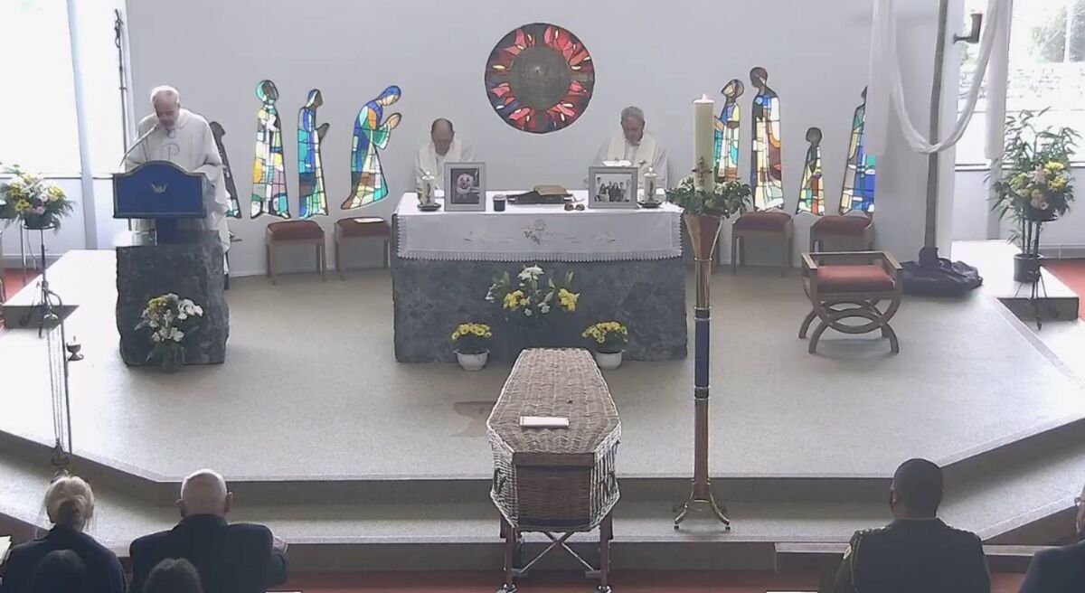 A photo of his beloved dog, Oscar, and a favourite coffee mug were among the items brought before the altar as symbols of Mr Snee's life. A photo of his beloved dog, Oscar, and a favourite coffee mug were among the items brought before the altar as symbols of Mr Snee's life.