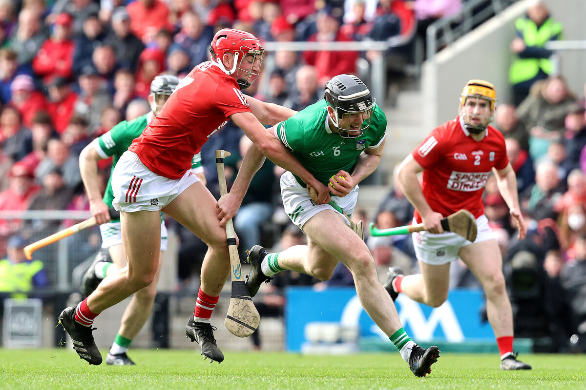 GETTING A STEP: Cork's Ciarán Joyce and Declan Hannon of Limerick at Pairc Ui Chaoimh in the Munster SHC opener.