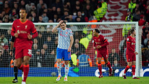 <p>Where next? Manchester United's Harry Maguire looks dejected after Liverpool's Mohamed Salah scores their side's second goal of the game at Anfield. Photo: Mike Egerton/PA Wire.</p>
