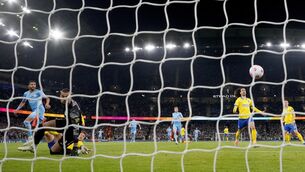 <p>Nerves settled: Manchester City's Riyad Mahrez scores the opening goal against Brighton at the Etihad Stadium. Photo: Martin Rickett/PA Wire.</p>