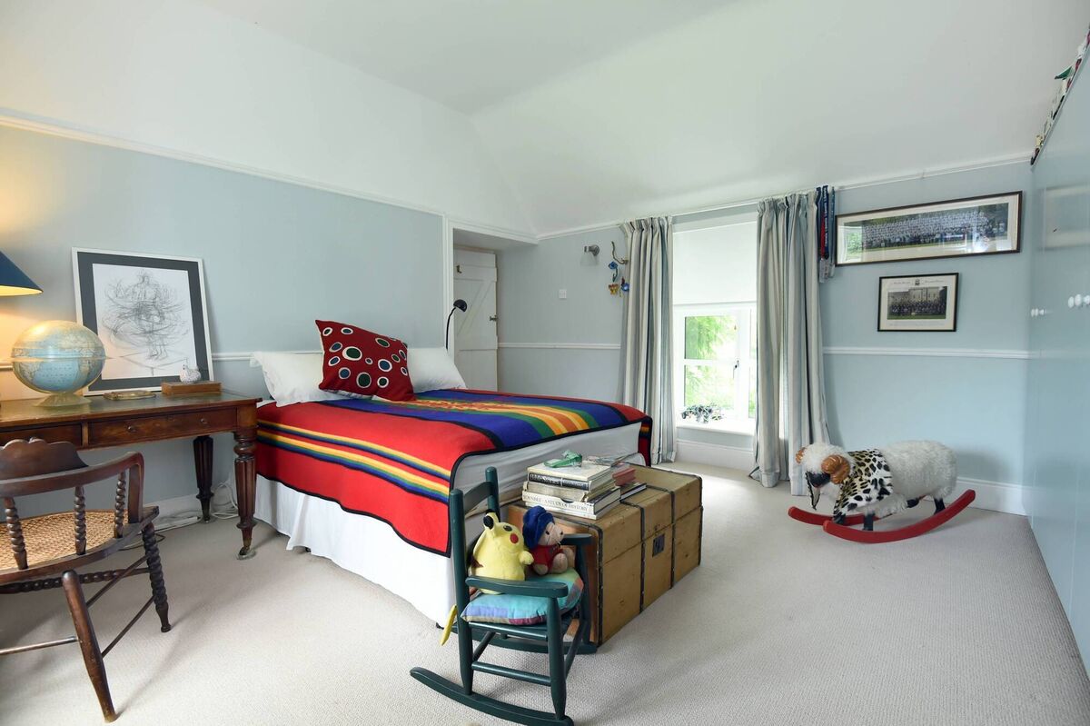 One of the six spread out  bedrooms