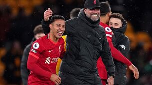 <p>Protective arm: Liverpool manager Jurgen Klopp saw midfielder Thiago Alcantara sidelined for two months after last season's Merseyside Derby. Photo: PA Wire</p>