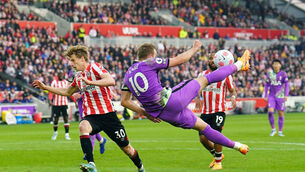 <p>Tottenham Hotspur's Harry Kane (centre) with an attempt at goal during the Premier League match at the Brentford Community Stadium, London. Picture: Adam Davy/PA Wire </p>