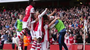 <p>Arsenal's Granit Xhaka (on knees) is mobbed by team-mates after scoring their side's third goal of the game during the Premier League match at the Emirates Stadium, London. Picture: John Walton/PA Wire. </p>