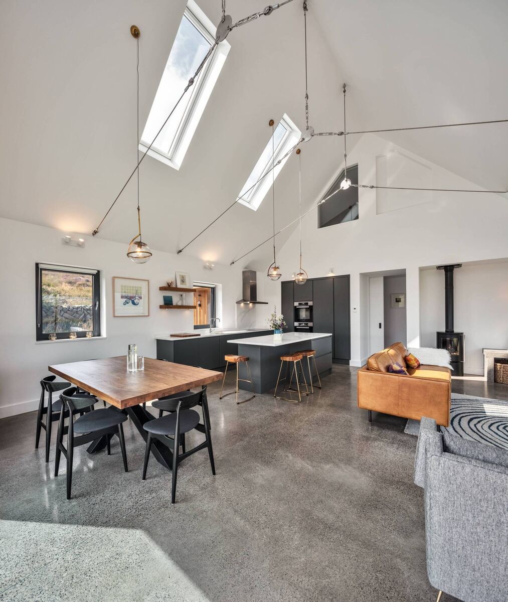 Of the interior, the owners say they 'didn't want to make it look like it was a house because of its commercial past'. 