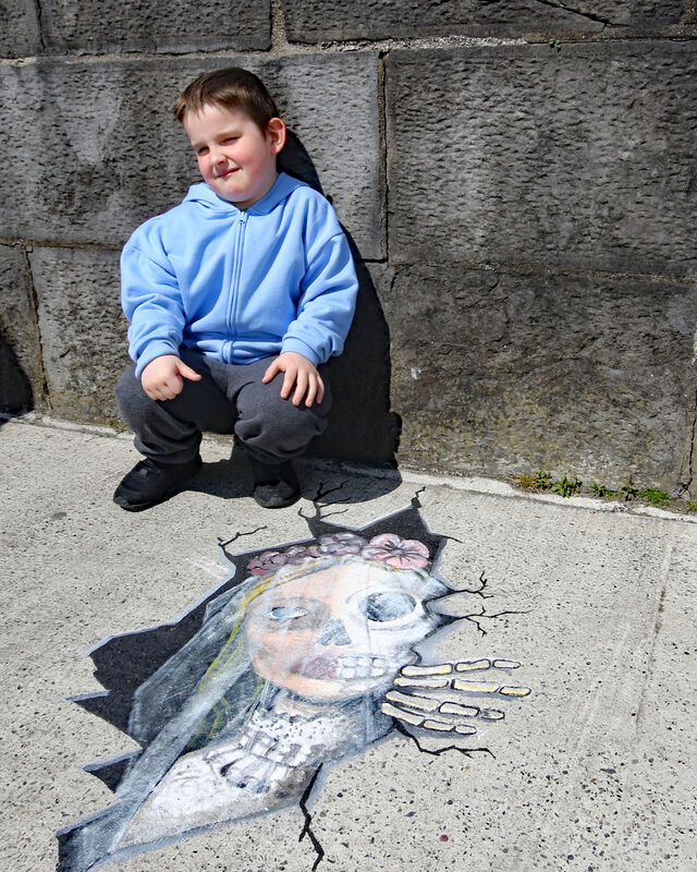 Four-year-old James Massey from St Mary's Park, admiring a spooky trompe l'oeil painted on a Limerick City pavement in... But we can't tell you where, as it's a scavenger hunt. Maps will be available at the Hunt Museum and online via the link at the foot of this article. Picture: Brendan Gleeson Four-year-old James Massey from St Mary's Park, admiring a spooky trompe l'oeil painted on a Limerick City pavement in... But we can't tell you where, as it's a scavenger hunt. Maps will be available at the Hunt Museum and online via the link at the foot of this article. Picture: Brendan Gleeson