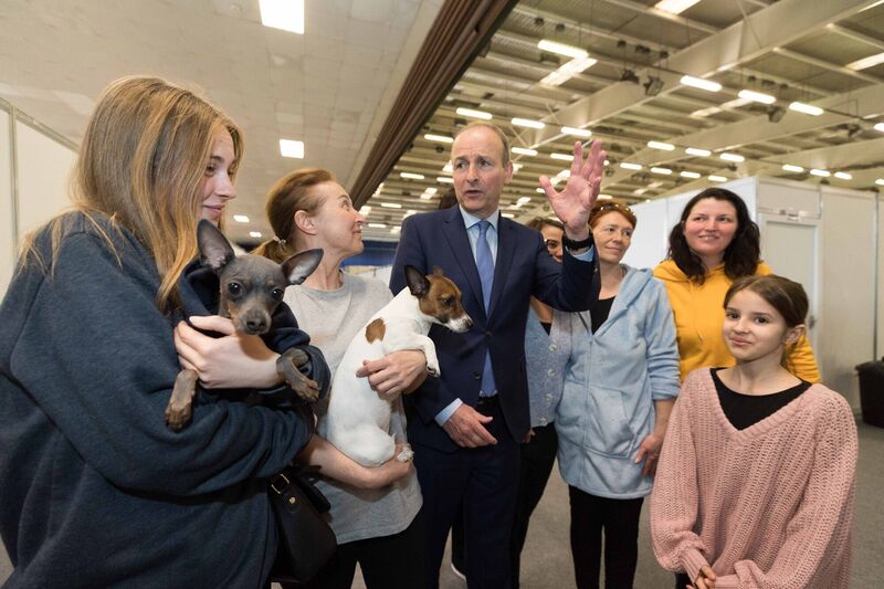 Taoiseach Micheál Martin meeting recent arrivals from Ukraine including Diana Ikonnikova and Iryna Brunova and their pet dogs when he visited the emergency accommodation centre at the Green Glens Arena in Millstreet on Sunday. Picture: Eamon Ward Taoiseach Micheál Martin meeting recent arrivals from Ukraine including Diana Ikonnikova and Iryna Brunova and their pet dogs when he visited the emergency accommodation centre at the Green Glens Arena in Millstreet on Sunday. Picture: Eamon Ward