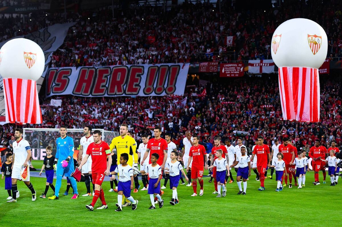 PARADE: Liverpool and Sevilla players walk at St. Jakob-Park in Basel on May 18, 2016