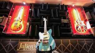 <p>Kurt Cobain’s 1969 Fender Mustang Competition Lake Placid Blue Finish electric guitar, which he used in the video for Nirvana’s Smells Like Teen Spirit, on display at the Hard Rock Cafe, London, before it goes up for auction, with an estimate of 600,000 – 800, 000 US dollars in the Julien’s Auctions Music Icons three-day auction event in New York, beginning on May 20. Picture date: Wednesday April 27, 2022.</p>