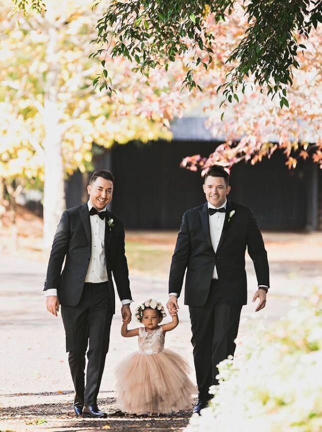 Damien Buckley and Mark Davidson with their daughter Izzy. Damien Buckley and Mark Davidson with their daughter Izzy.