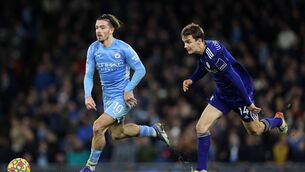 <p>MANCHESTER, ENGLAND - DECEMBER 14: Jack Grealish of Manchester City battles for possession with Diego Llorente of Leeds United during the Premier League match between Manchester City and Leeds United at Etihad Stadium on December 14, 2021 in Manchester, England. (Photo by Clive Brunskill/Getty Images)</p>
