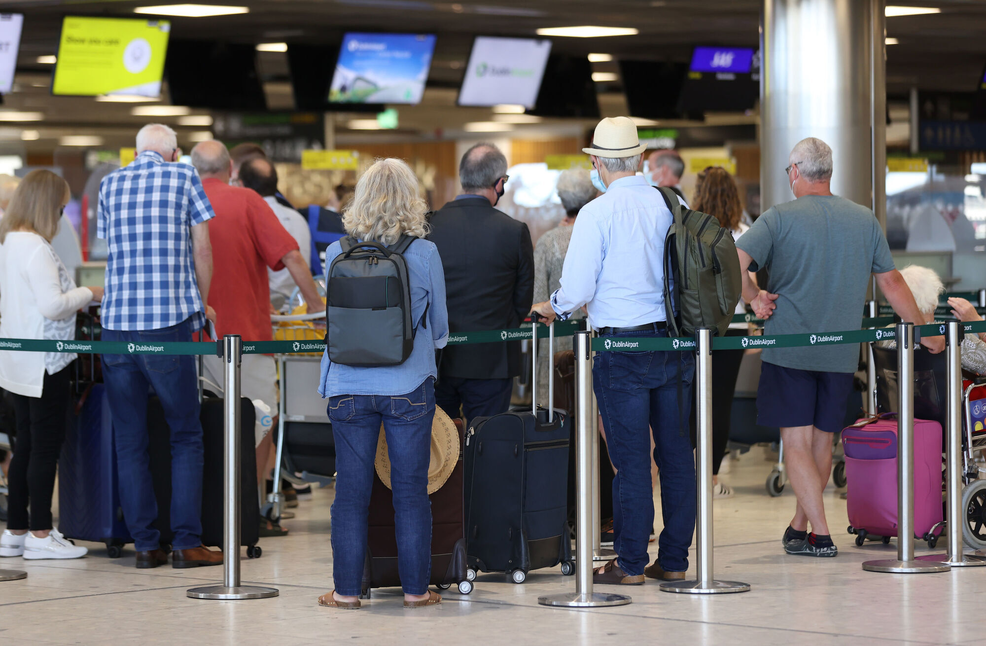 People queuing at Dublin Airport last month. The airport says it is "on track" to have security staff at full capacity by June, alleviating the problem. Picture: PA