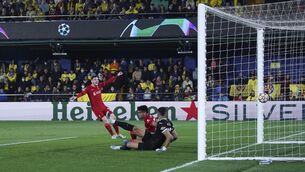 <p>EQUALISER: Liverpool's Luis Diaz heads his side's second goal in Villarreal Tuesday night.</p>