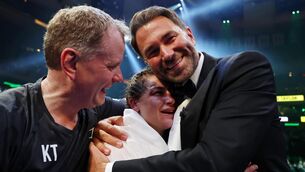 <p>Golden tickets: Katie Taylor celebrates her victory at Madison Square Garden with Eddie Hearn and Brian Peters. Pic:INPHO/Matchroom Boxing/Ed Mulholland</p>