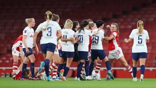 <p>LONDON, ENGLAND - MAY 04: Katie McCabe of Arsenal clashes with Ashleigh Neville of Tottenham Hotspur during the Barclays FA Women's Super League match between Arsenal Women and Tottenham Hotspur Women at Emirates Stadium on May 04, 2022 in London, England. (Photo by Catherine Ivill/Getty Images)</p>