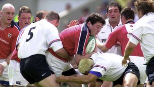 <p>On the march: On a day when the Red Army was truly born, Anthony Foley of Munster is tackled by Franck Belot, left, and Chriastan Labit of Toulouse during the 2000 Heineken Cup Semi-Final at the Stade du Parc Lescure in Bordeaux. Pic: Brendan Moran/Sportsfile</p>