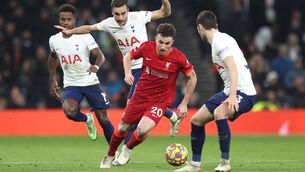 <p>LONDON, ENGLAND - DECEMBER 19: Diogo Jota of Liverpool takes on Harry Winks of Tottenham during the Premier League match between Tottenham Hotspur and Liverpool at Tottenham Hotspur Stadium on December 19, 2021 in London, England. (Photo by Alex Pantling/Getty Images )</p>