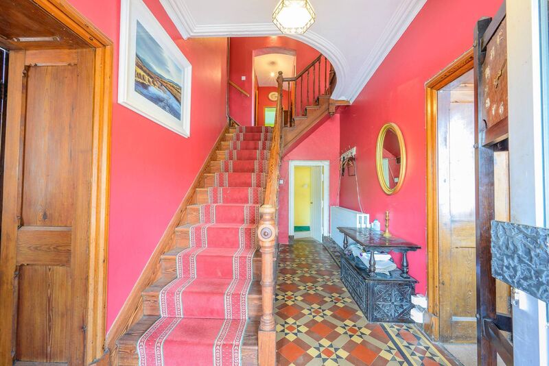 Quality interior, even if a bit dated, with pitch pine stairs, doors and other joinery