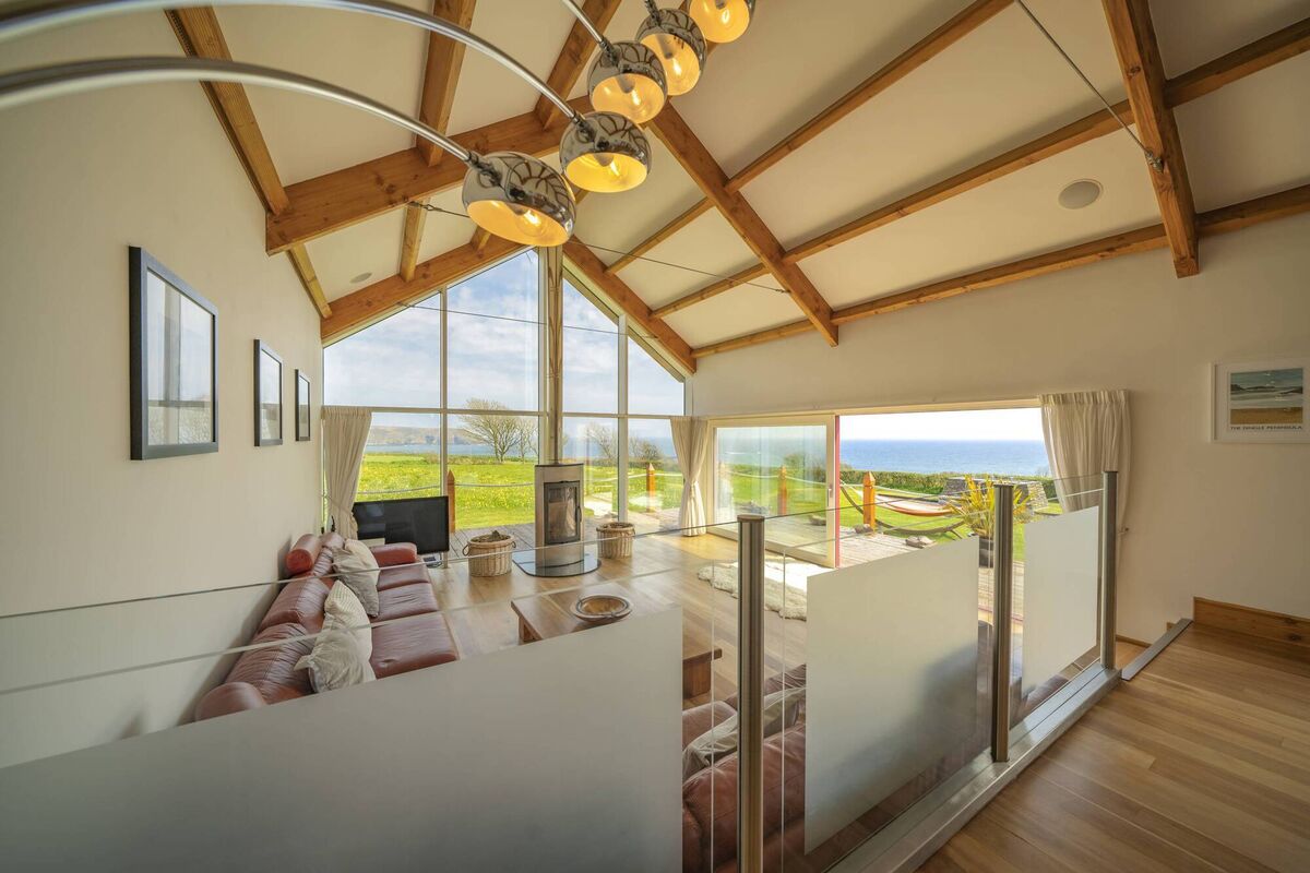 Lofty interior, feature stove and views in every direction Lofty interior, feature stove and views in every direction
