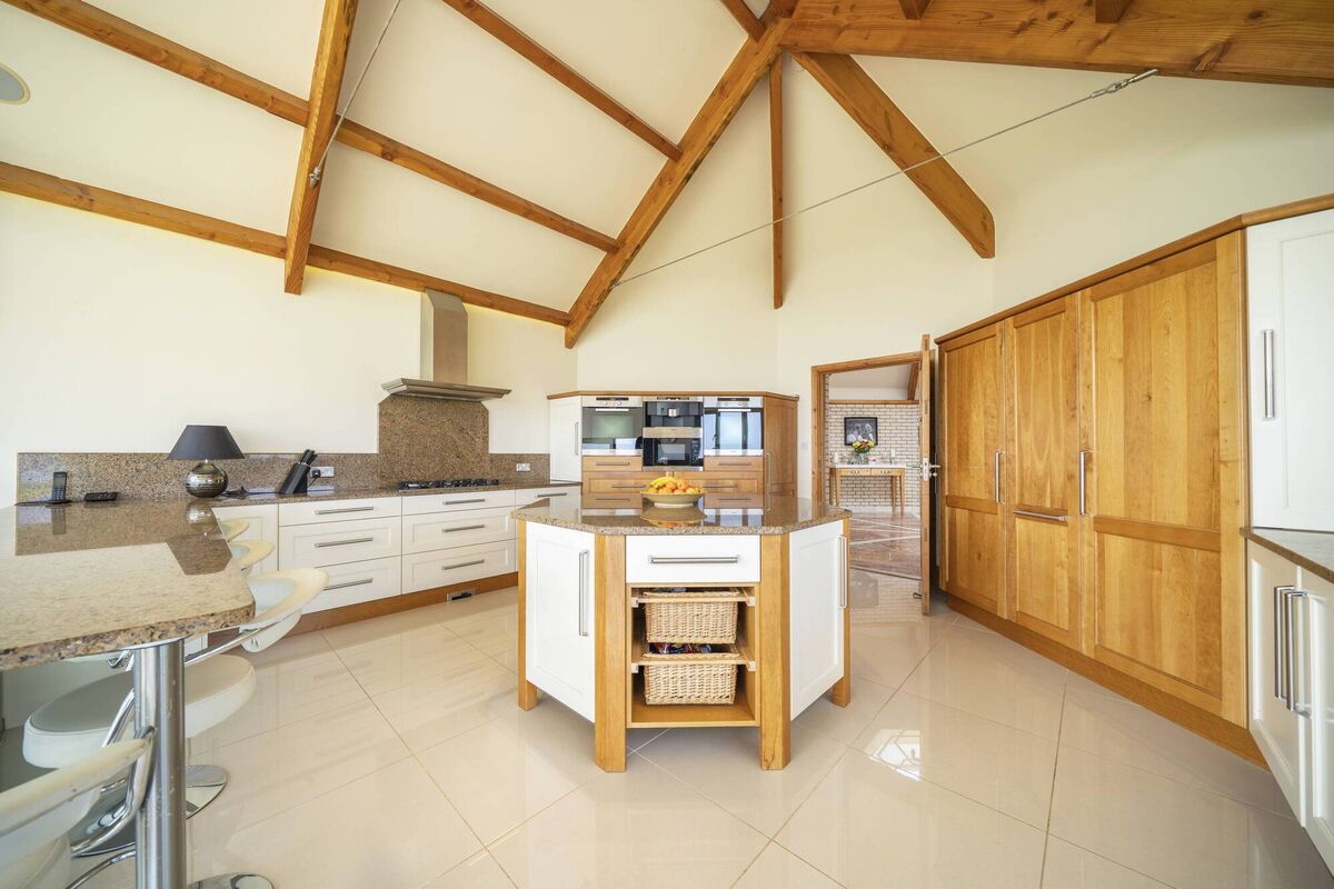Kitchen picks up the octagon vibe in the island Kitchen picks up the octagon vibe in the island