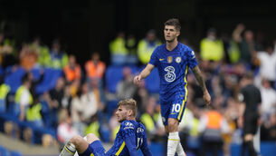 <p>Chelsea's Timo Werner, left, sits on the field at the end of the draw with Wolves at Stamford Bridge  (AP Photo/Frank Augstein)</p>