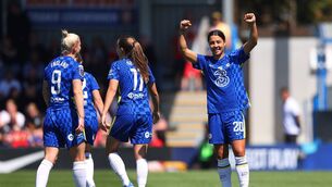 <p>KINGSTON UPON THAMES, ENGLAND - MAY 08: Sam Kerr of Chelsea celebrates after scoring their team's fourth goal during the Barclays FA Women's Super League match between Chelsea Women and Manchester United Women at Kingsmeadow on May 08, 2022 in Kingston upon Thames, England. (Photo by Catherine Ivill/Getty Images)</p>
