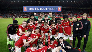Manchester United players celebrate after winning the FA Youth Cup final (Richard Sellers/PA)