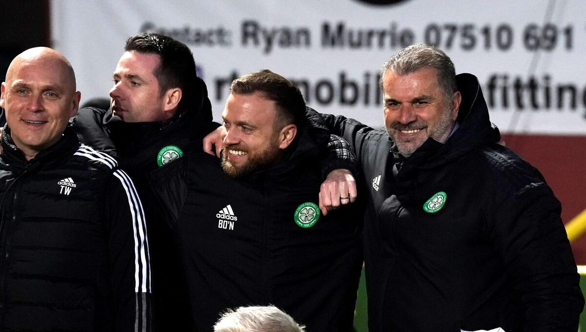 Feels so good: Celtic manager Ange Postecoglou (right) with his coaching staff after the cinch Premiership match at Tannadice Park, Dundee. Picture date: 
